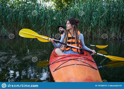Beautiful Young Couple Kayaking On Lake Stock Image Image Of