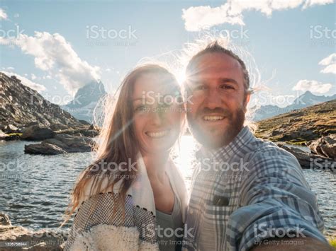 Couple Take Selfie With The Famous Matterhorn Mountain In Switzerland