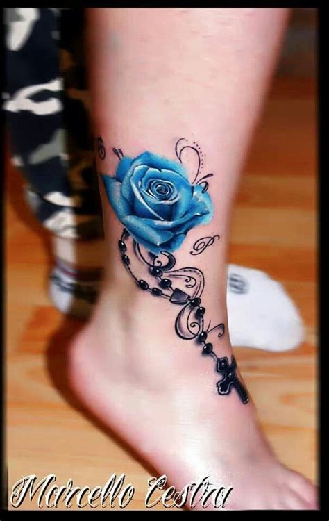 Women love rose tattoos because you can have roses with thorns or without. Blue rose cross tattoo | Tattoo | Pinterest | Blue roses ...