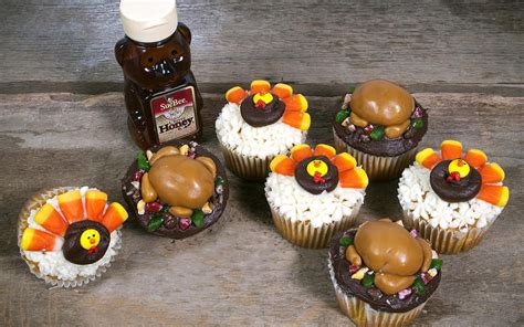 A guide to decorating for thanksgiving and autumn. Candy-Decorated Thanksgiving Cupcakes - Sioux Honey ...