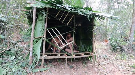 primitive life make a tent with trees to survive the rainy season primitive survival hmt