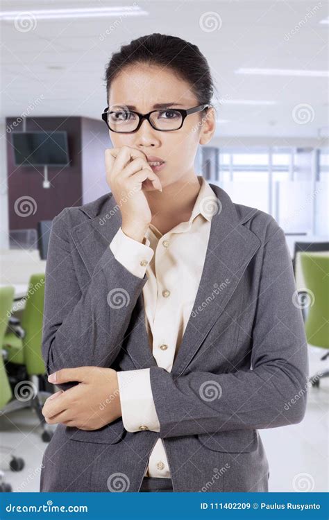 Worried Businesswoman Biting Finger Stock Image Image Of Attractive