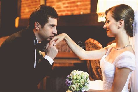 Handsome Groom Kisses Bride S Delicate Hand Stock Photo Image Of