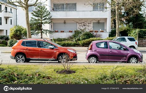 Two Peugeot Cars Parked Street Stock Editorial Photo © Ifeelstock
