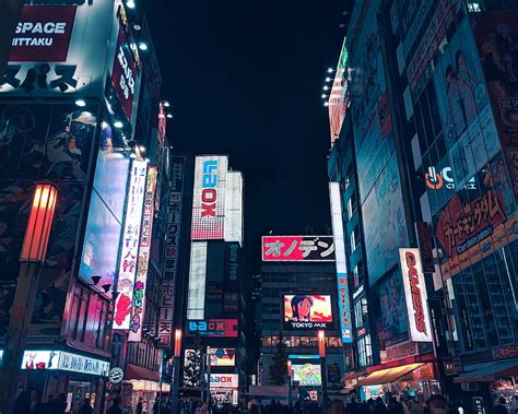 Lighted City Buildings During Nighttime Hd Wallpaper Peakpx