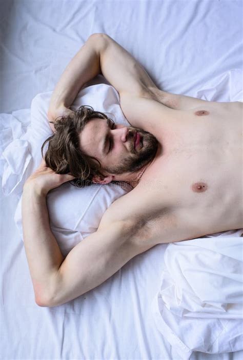 Man Unshaven Handsome Guy Naked Torso Sleep Nap On Bed Guy Macho Lay White Bedclothes Stock