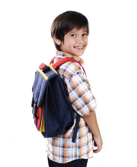 Niño De Escuela Aislado Sonriendo Foto Premium