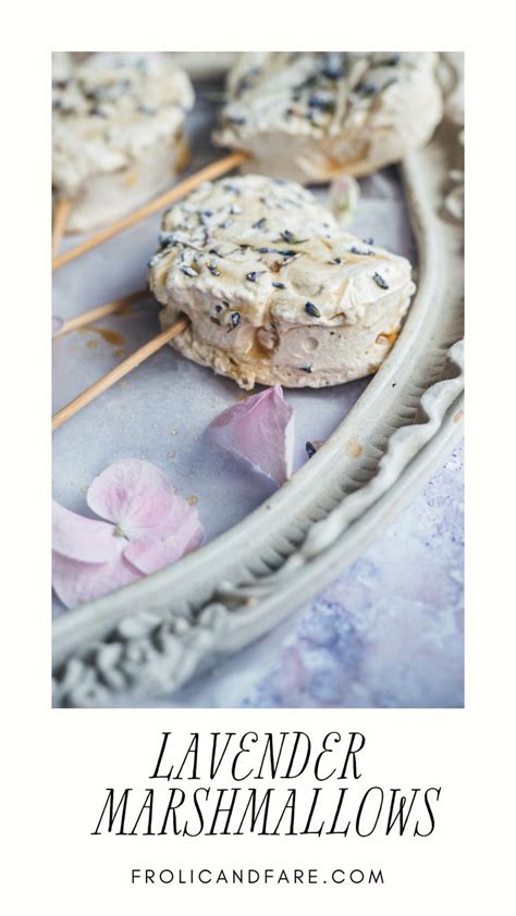 Up Close Photo Of Thick Pillowy Marshmallows With Lavender Buds Drizzled With Honey On A Purple