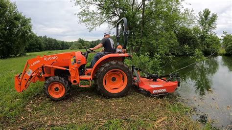 29 Brush Hogging With The Kubota L2501 And Clearing Trails Youtube