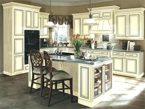 Notice that the original hardware, granite, mirror, sinks and plumbing fixtures remain. off white kitchen cabinets - Google Search | Antique white kitchen cabinets, Antique white ...