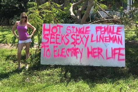 Look Power Restored After Woman Puts Up Sexy Sign Seeking Help