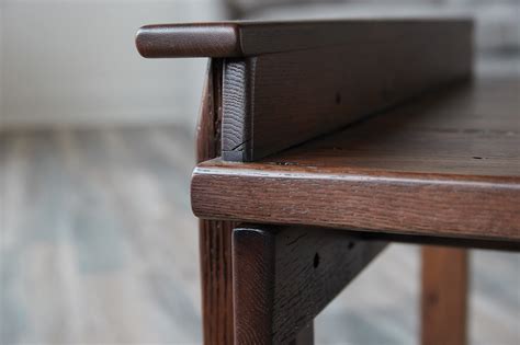 The top is finished in natural tung oil. Creston Coffee Table, Reclaimed Fumed Oak | EJ Victor