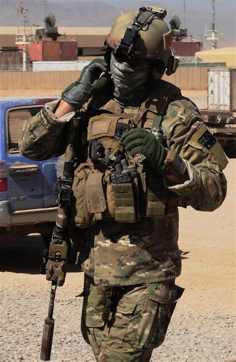 A Special Operations Task Group Sotg Soldier Turns On His Hearing