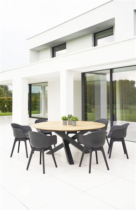 All white round dining table and chairs. Modern Black White Polypropyleen Dining Chair Contract ...