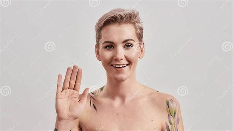 Happy To See You Portrait Of Cheerful Half Naked Tattooed Woman With Pierced Nose And Short