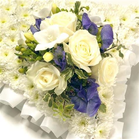 Maybe you would like to learn more about one of these? Traditional Based Pillow - Funeral Flowers