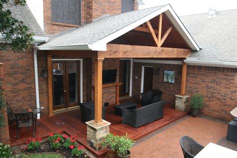 Nice Hardwood Deck And Gable Roof Patio Cover With Ledgestone Half