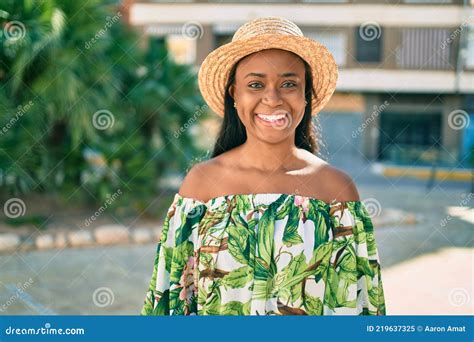 Young African American Tourist Woman On Vacation Smiling Happy Walking