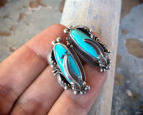 Traditional Navajo Turquoise Earrings With Sterling Silver Feather