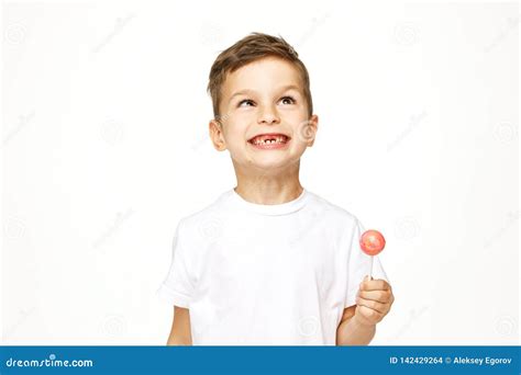 Little Boy With A Lollipop On A White Background Stock Photo Image Of