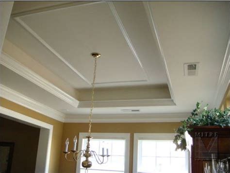 You can depend on a tray ceiling for covering roof truss, muffling sound and heat. ceiling crown molding in kitchen | 15. Tray ceiling with ...