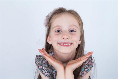 Little Girl Is Making Faces Funny And Happy Expressions Having Fun