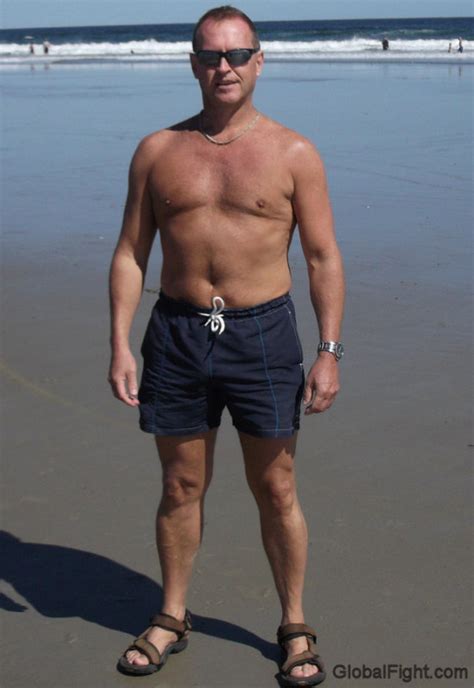 Suntanned Dad Swimming Trunks Standing Beach Photo Globalfight