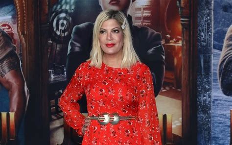 tori spelling sees doctor to have expired breast implants removed