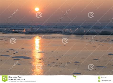 The Sun Set Over The Frozen Lake Stock Photo Image Of Surface White