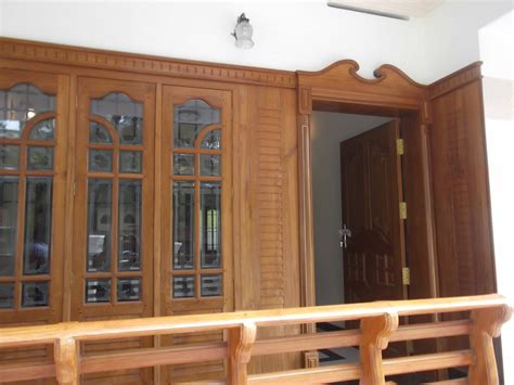 Kerala Style Carpenter Works And Designs Front Entrance Wooden Doors