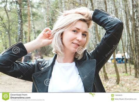 Portrait Of Smilling Blonde Young Girl In The Forest Close Up Stock Image Image Of Black