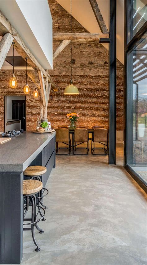 Old Farmhouse Converted Into A Warm Industrial Farmhouse With View Of