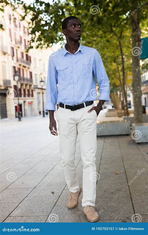 Full Length Portrait Of African American Walking Along City Street Stock Image Image Of