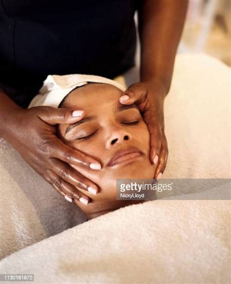 black woman spa facial photos and premium high res pictures getty images