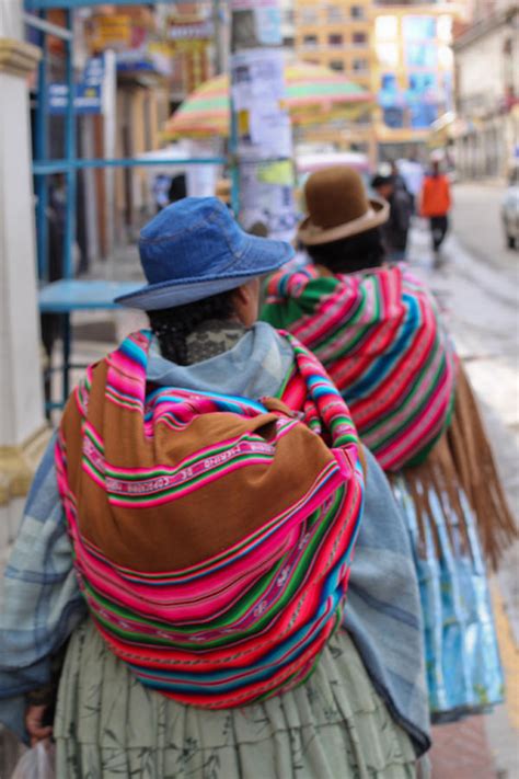 These badass bolivian women are taking mountain climbing to new heights. Bolivian Women Photograph by Geraint Rowland