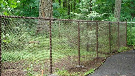 Our vinyl coated fences are available in black, green, brown or white. BROWN VINYL CHAIN LINK - Fitzpatrick Fence And Rail