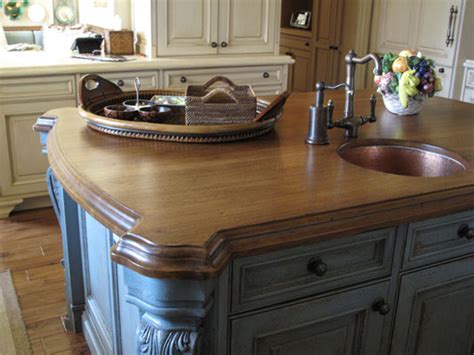 Choosing a kitchen countertop surface is a major decision in terms of cost, aesthetics and the practical function of your kitchen. Hickory Countertops - J. Aaron