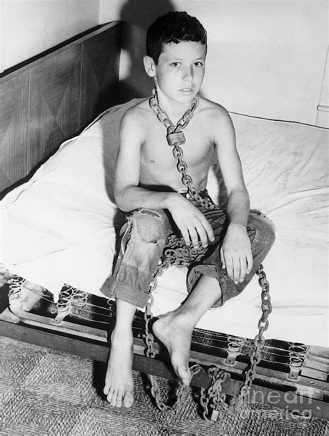Boy Chained By Neck To His Bed Art Print By Bettmann
