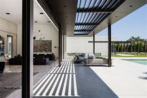 Concrete And Glass Surfaces Extend From Inside To Outside Of Israeli
