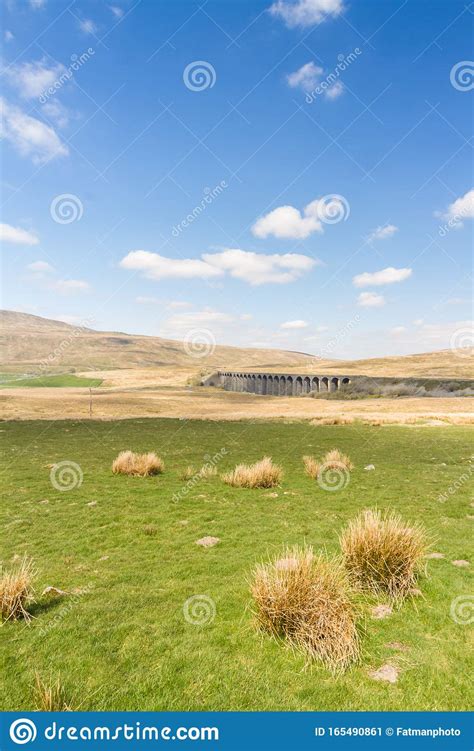 Rolling Green Hills With Blue Sky And Cloud Railway Viaduct In
