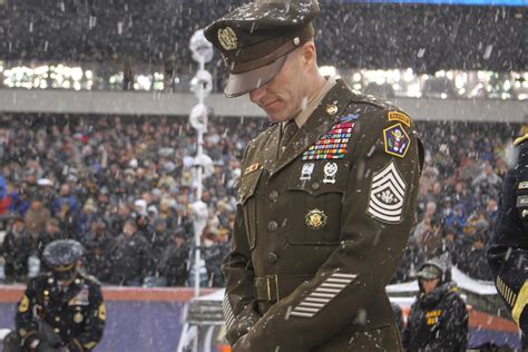 Sergeant Major Of The Army Dan Dailey Bows In Prayer Prior To Kickoff