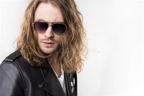 Young Handsome Rocker In Black Leather Jacket And Sunglasses Isolated