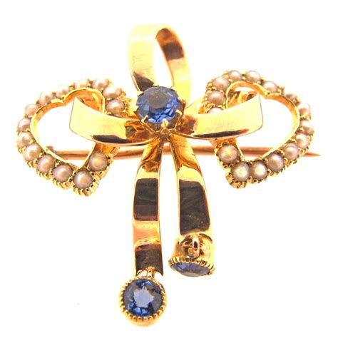Antique Gold Sapphire And Pearl Bow And Heart Brooch Ar Ullmann