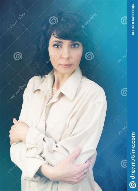 Beautiful Brunette With Short Hair Close Up Blue Background Stock