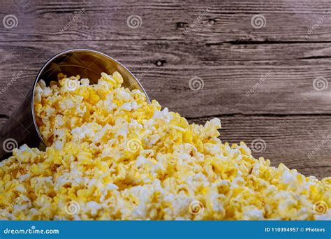 Box Of Popcorn Spilled On Wood Background Stock Image Image Of