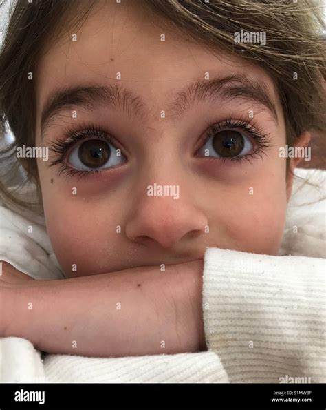 Little Girl With Big Brown Eyes Stock Photo Alamy