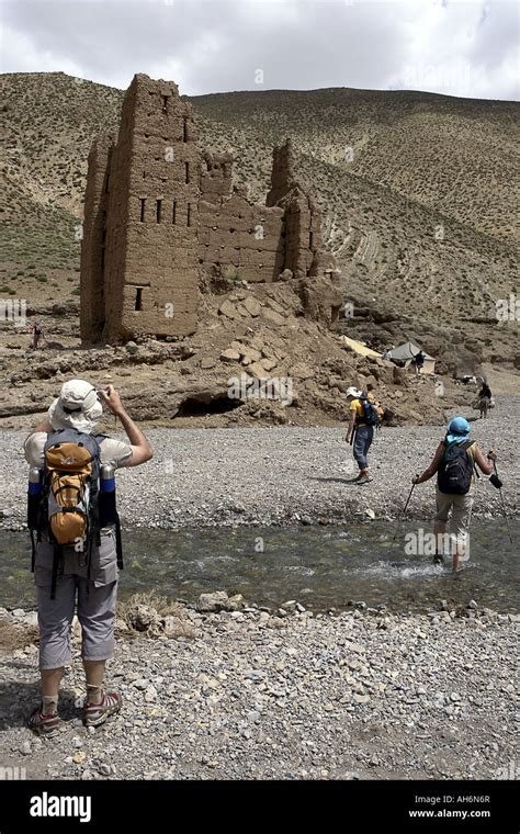 Trekking In Morocco Hikers Arriving At Tighremt N Ait Ahmed Ruins Of An