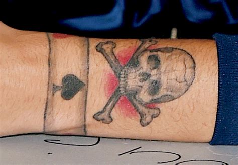 Louis Tomlinson Debuts Skull And Crossbones Wrist Tat During Detroit Show