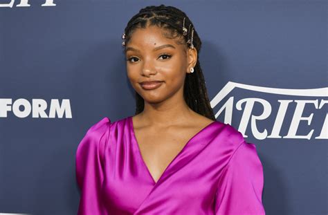 halle bailey proves she s perfect for the little mermaid in official trailer listen to her
