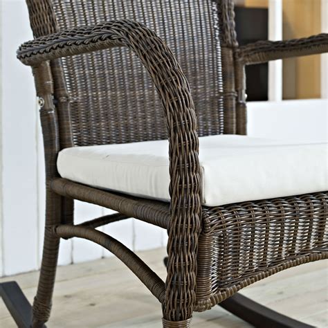 Make the most of your down time with a comfortable place to sit, read, and enjoy a drink with an outdoor wicker rocking chair. Indoor/Outdoor Patio Porch Mocha Wicker Rocking Chair with ...